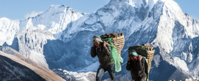 Sherpas carrying load